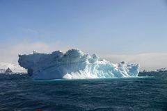 19D Large Iceberg In The Water Off Aitcho Barrientos Island In South Shetland Islands From Zodiac On Quark Expeditions Antarctica Cruise.jpg